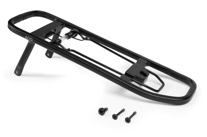 Der ACID Gepäckträgeraufsatz SIC 2.0 TOP RAIL von ACID ist ein schwarzer Fahrrad-Hinterradgepäckträger aus Metall mit integrierter Federklappe, abgebildet auf weißem Hintergrund mit drei Befestigungsschrauben an der Vorderseite.