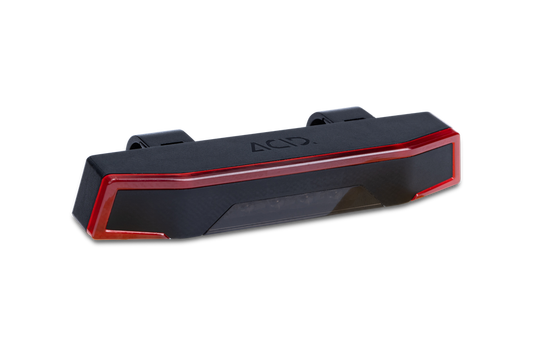 Das ACID E-Bike Gepäckträgerrücklicht PRO-E HPP schwarz BES3 ist ein schlankes, schwarz-rotes, rechteckiges Rücklicht mit oberen Halterungen und dem ACID-Logo. StVZO-geprüft für Sicherheit und Konformität.