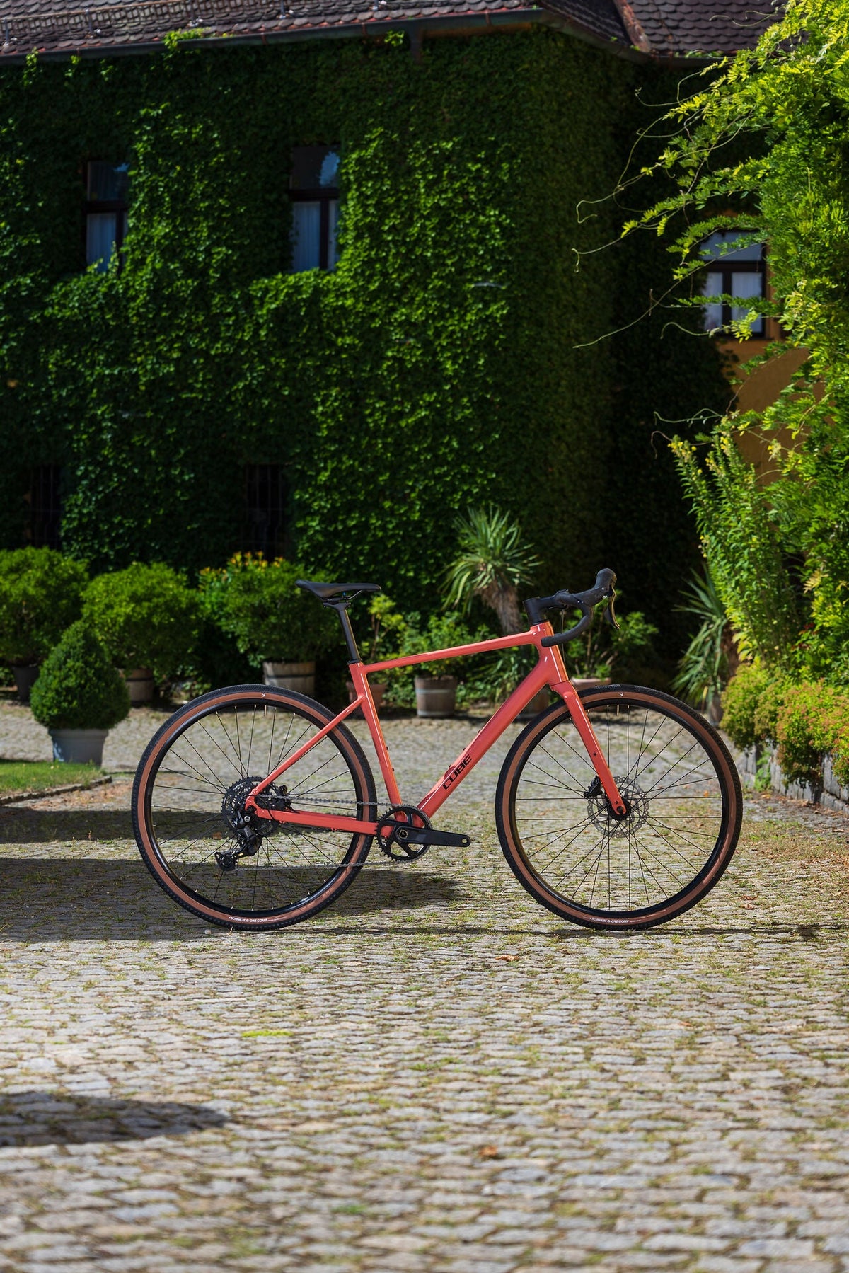 Cube Nuroad ONE spicypapaya´n´black 2027 – Gravelbike – Seitenansicht 1