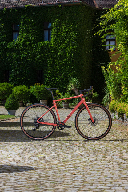 Cube Nuroad ONE spicypapaya´n´black 2027 – Gravelbike – Seitenansicht 1
