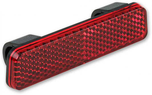 Der ACID Gepäckträgerreflektor SLIM CLIP red Reflektor ist ein rechteckiger, strukturierter roter Reflektor mit schwarzer Halterung für die Clipmontage am Fahrradgepäckträger und erhöht die Sichtbarkeit und StVZO-konforme Sicherheit.