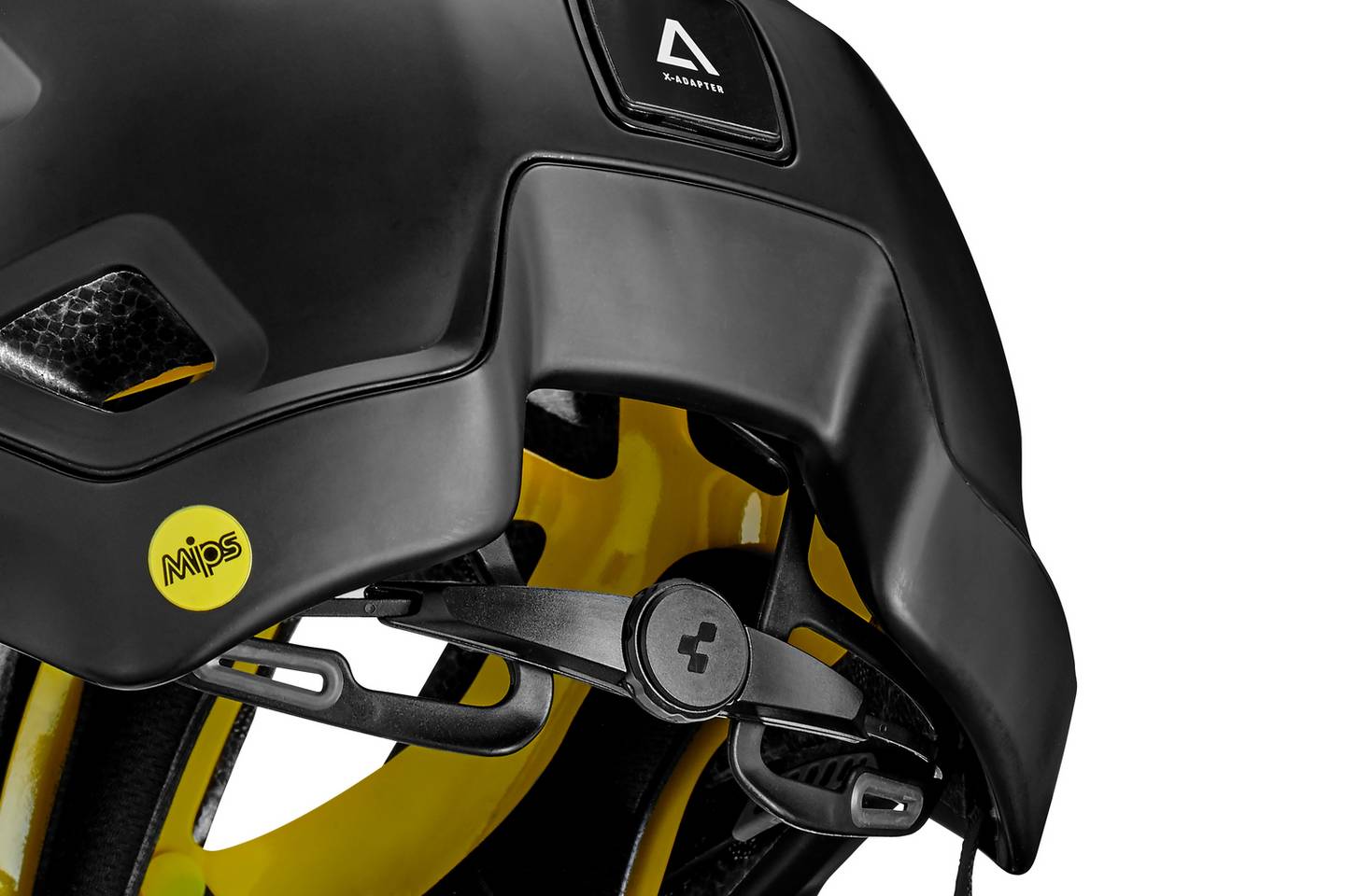 Nahaufnahme des Cube CUBE Helm STROVER, ein schwarzer MTB-Enduro-Helm mit gelber Innenpolsterung, MIPS-Technologie für Sicherheit, CUBE Natural Fit System für Komfort und einem verstellbaren Hinterriemen.