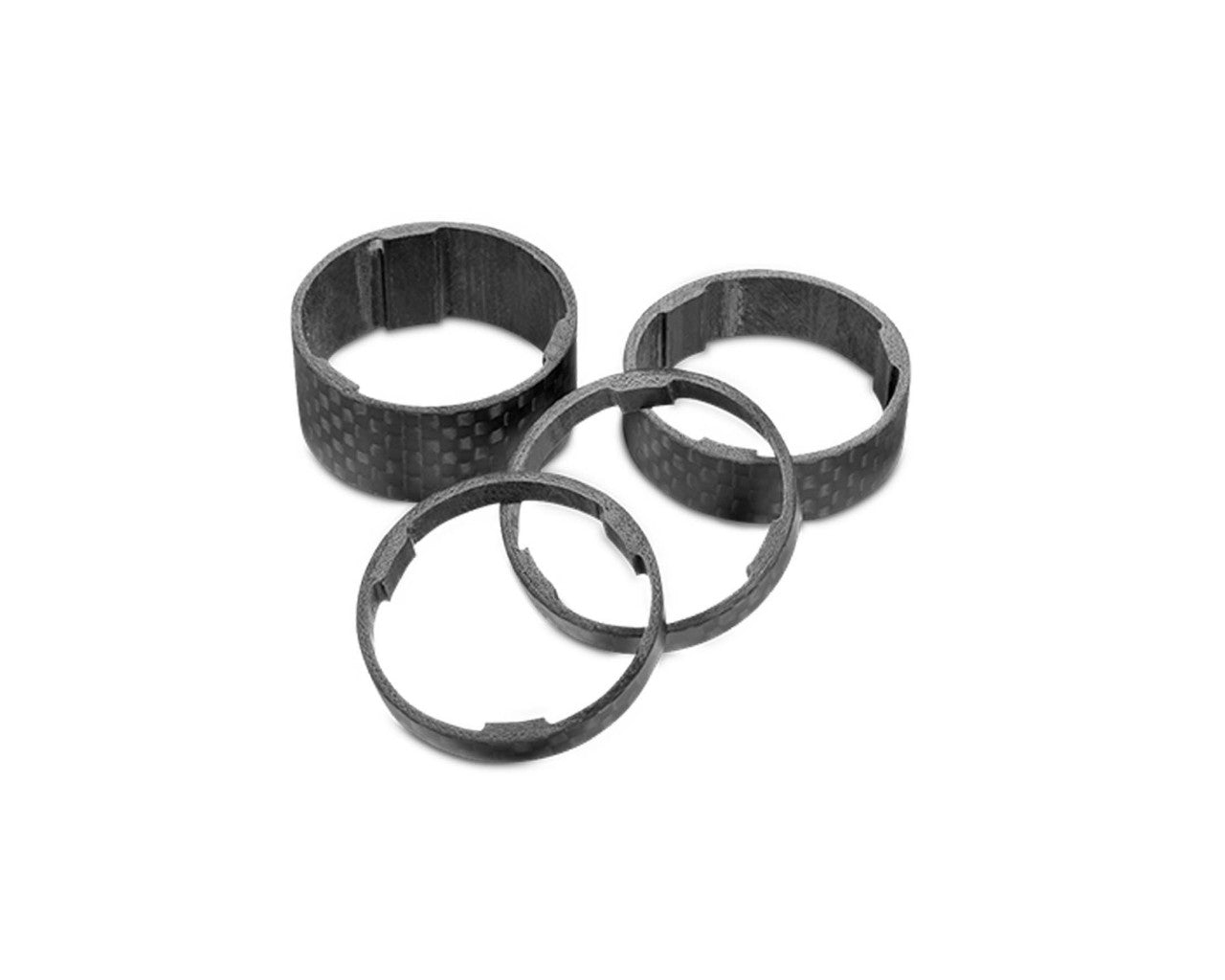 Das RFR Spacer Set 1 1/8 von RFR umfasst drei ultraleichte Carbonfaser-Spacer und zwei dünnere Ringe mit strukturiertem Muster, passend für eine 1 1/8 Zoll Gabelschaft, zylindrisch und leicht.